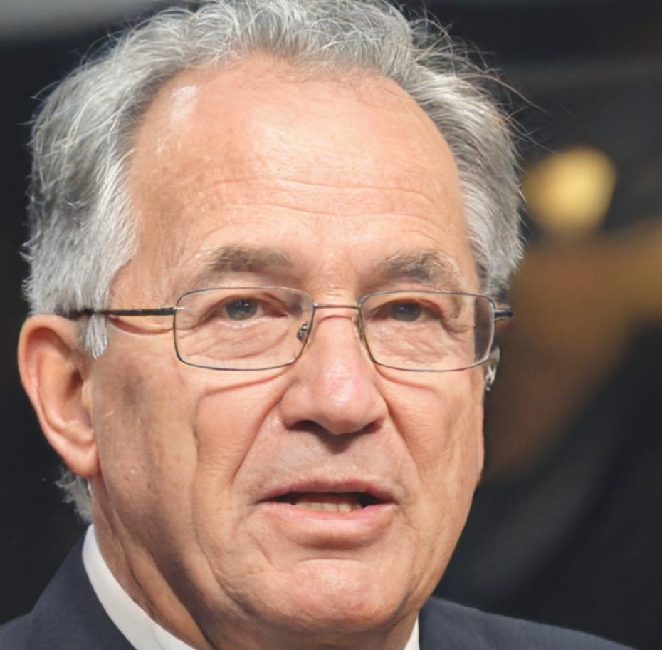 Senior financial analyst reviewing market charts and economic data